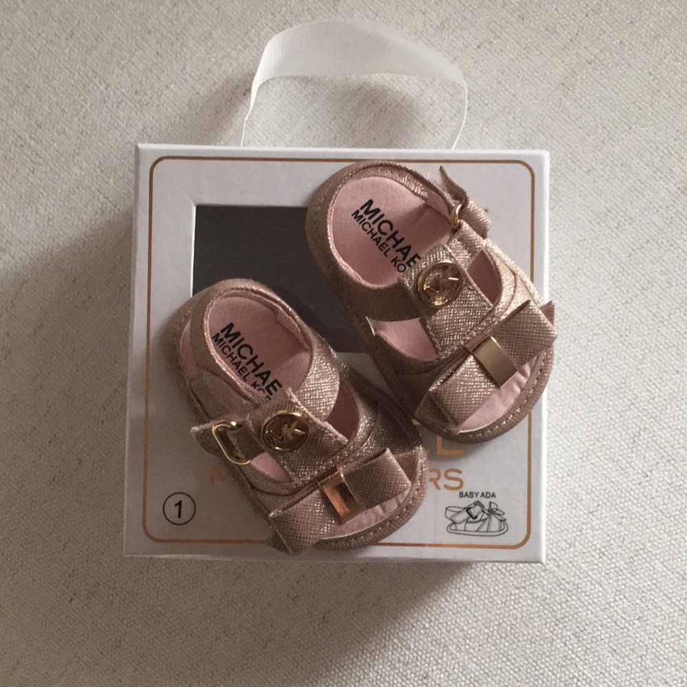 Michael Kors baby shoes.